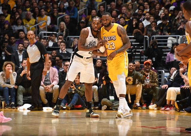 立陶宛男篮击败强敌晋级（立陶宛男篮力克劲敌成功晋级）